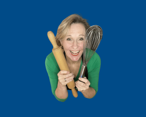 Volunteer 1 Image of Toni with rolling pin and whisk